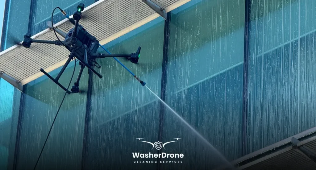 Drone cleaning windows with water spray